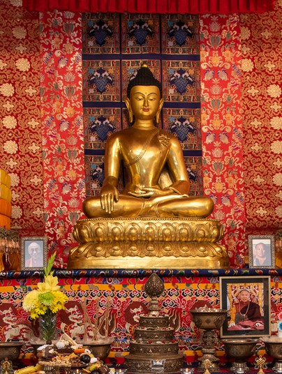Big golden Buddha statue in the meditation shrine hall.