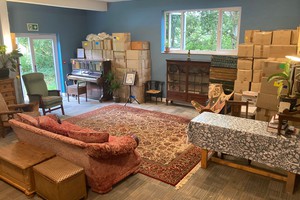 Comfortable couches and cozy carpets in the reading area in Buddhist library.