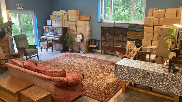 Comfortable couches and cozy carpets in the reading area in Buddhist library.