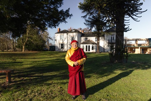 Chokyi Nyima Rinpoche outside the main hall at Lindholme Hall Estate.