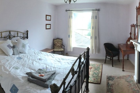 Solitary retreat room at Buddhist retreat and meditation centre, Lindholme Hall, Yorkshire, UK