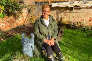 Volunteer Lucy with Buddha Statue
