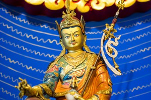 Golden statue Guru Rinpoche Buddhism