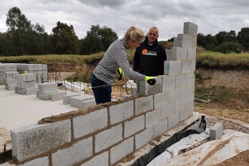 Buddhist temple UK block laying