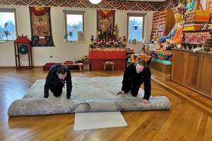 Preparing gompa Buddhism Preparations for seminar on Buddhism in meditation hall.